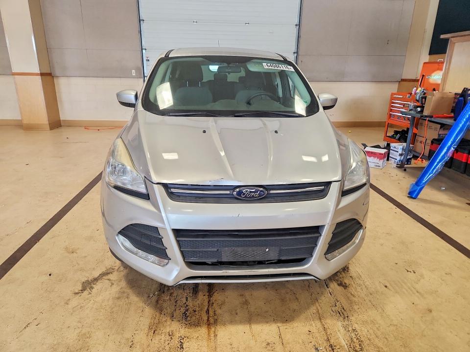 Photo 5 from auction – 2016 FORD ESCAPE with VIN 1FMCU9GX9GUA57210