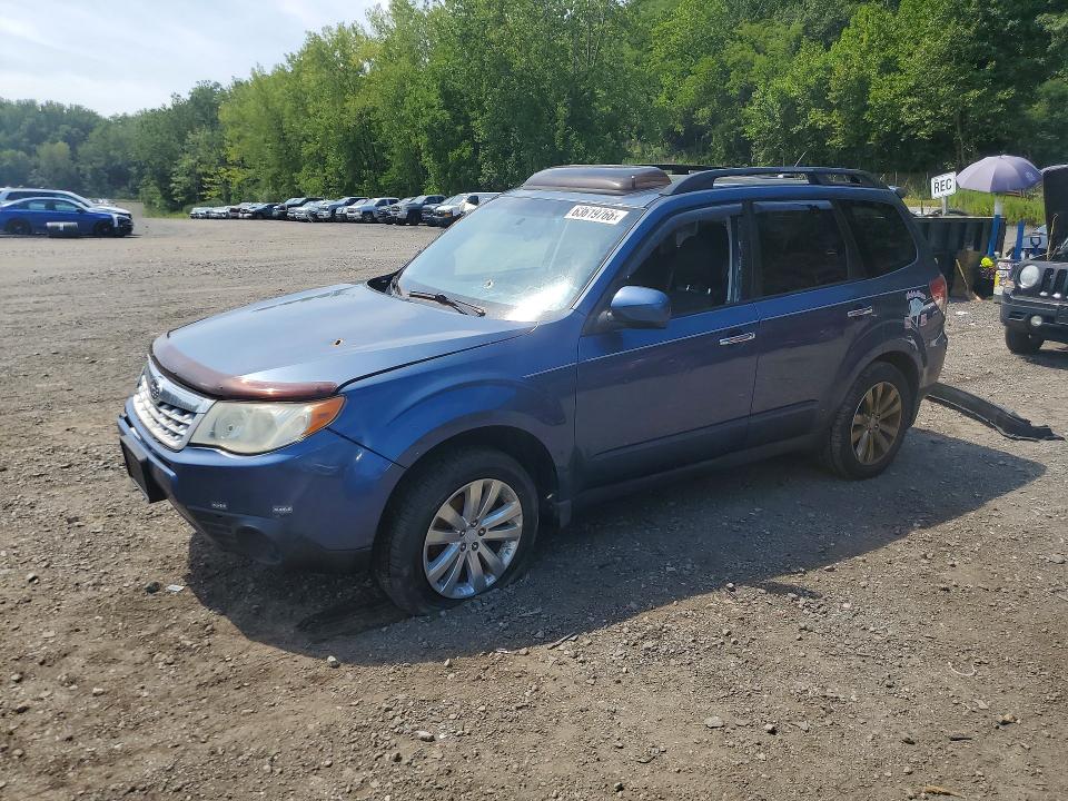 SUBARU FORESTER 2011 with VIN JF2SHADC0BH731142 - Photo from auction
