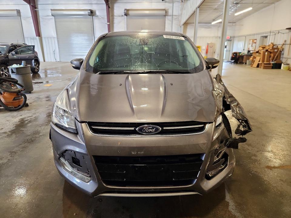 Photo 5 from auction – 2013 FORD ESCAPE with VIN 1FMCU0HX1DUD11675