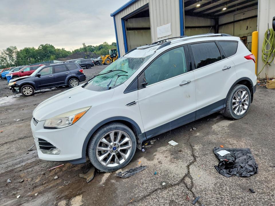FORD ESCAPE 2015 with VIN 1FMCU9GXXFUB23813 - Photo from auction