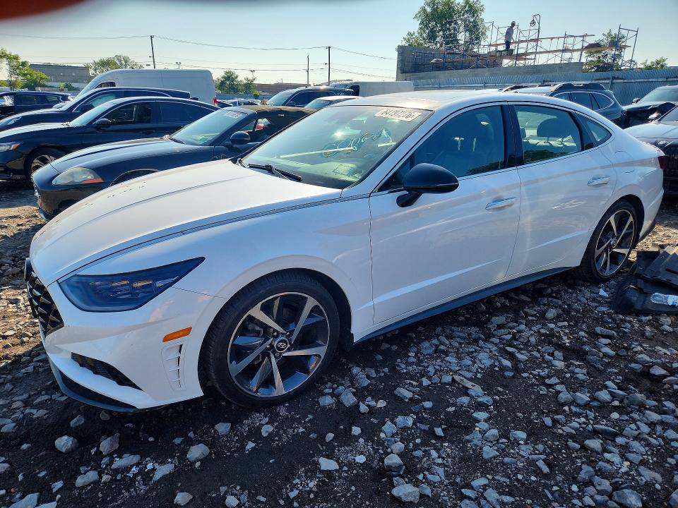 HYUNDAI SONATA 2023 с VIN KMHL44J22PA312149 - Снимка от търг