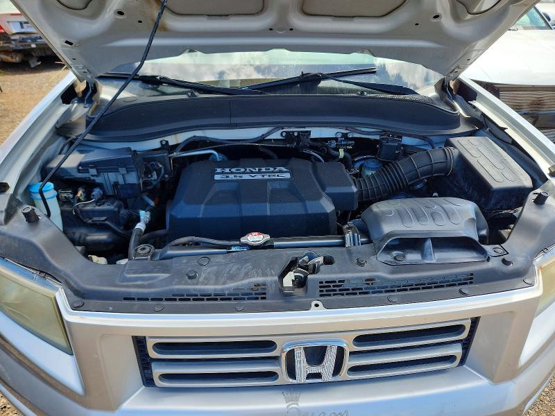 Снимка 11 от търг – 2007 HONDA RIDGELINE с VIN 2HJYK16227H531844