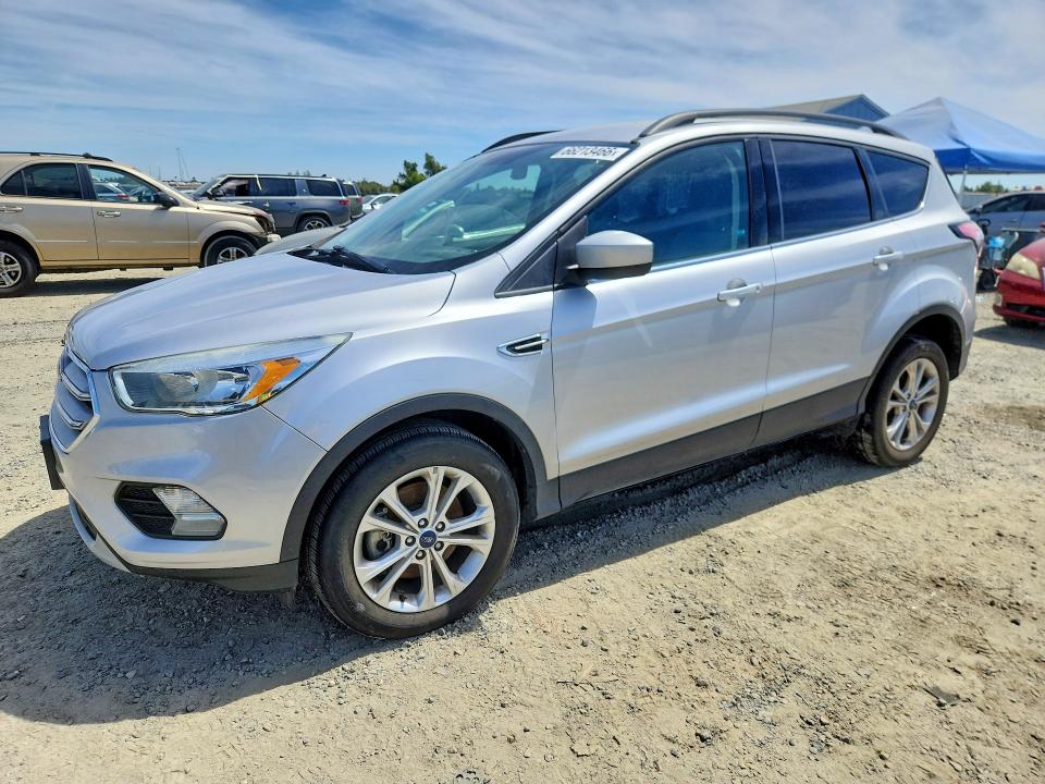 FORD ESCAPE 2018 with VIN 1FMCU9GD2JUA10761 - Photo from auction