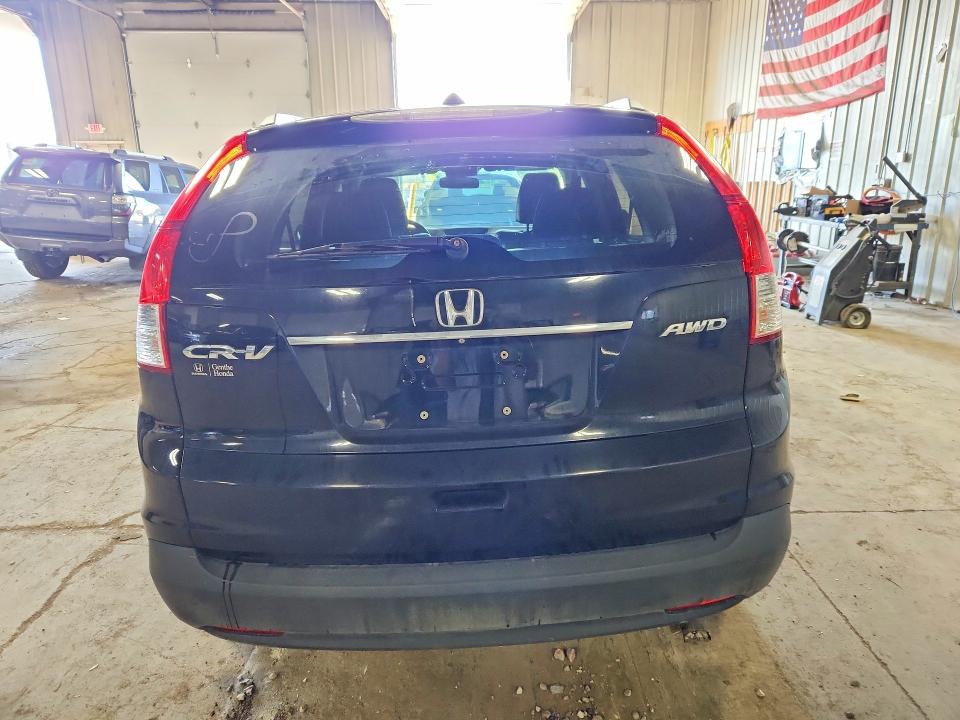 Photo 6 from auction – 2014 HONDA CR-V with VIN 2HKRM4H77EH684544