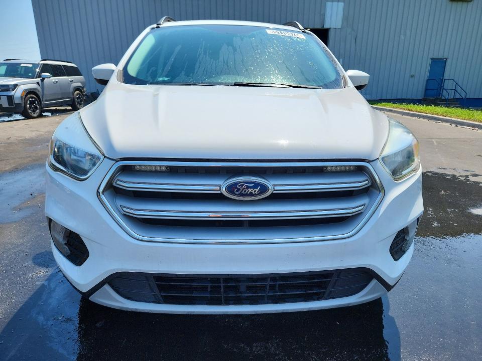 Photo 5 from auction – 2018 FORD ESCAPE with VIN 1FMCU9GD6JUB19711