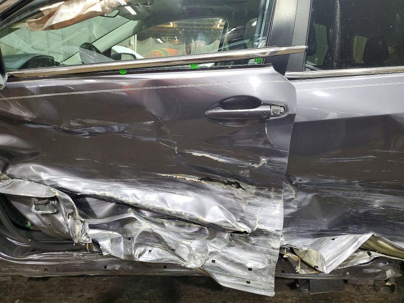 Photo 7 from auction – 2015 HONDA CR-V with VIN 3CZRM3H56FG711083
