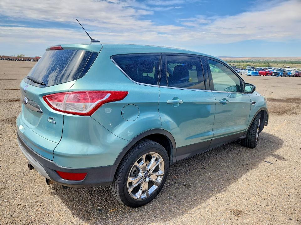 Photo 3 from auction – 2013 FORD ESCAPE with VIN 1FMCU9HX3DUC71748