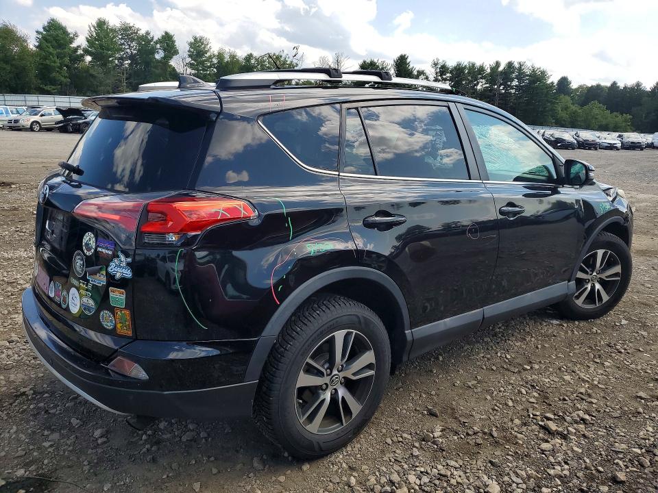 Photo 3 from auction – 2016 TOYOTA RAV4 with VIN 2T3RFREV6GW522880