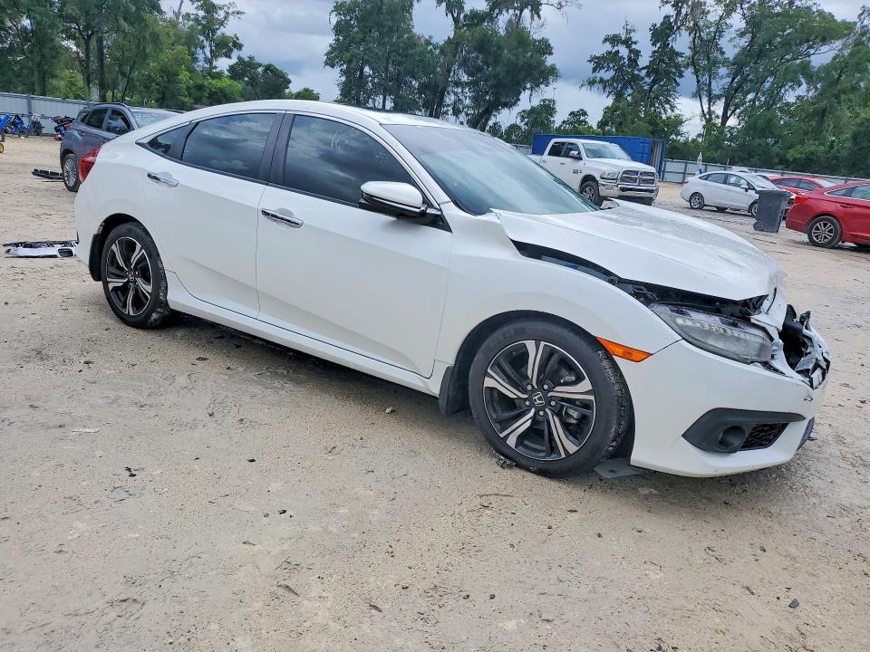 Photo 4 from auction – 2016 HONDA CIVIC with VIN 19XFC1F93GE034562