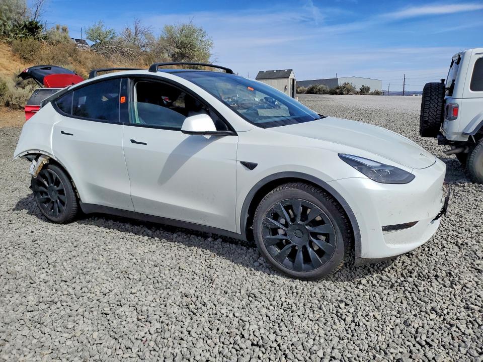 Photo 4 from auction – 2022 TESLA MODEL Y with VIN 7SAYGAEE8NF524419