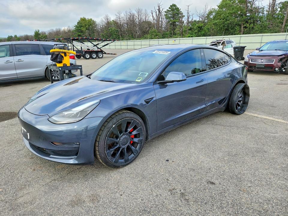 TESLA MODEL 3 2022 with VIN 5YJ3E1EC1NF124701 - Photo from auction