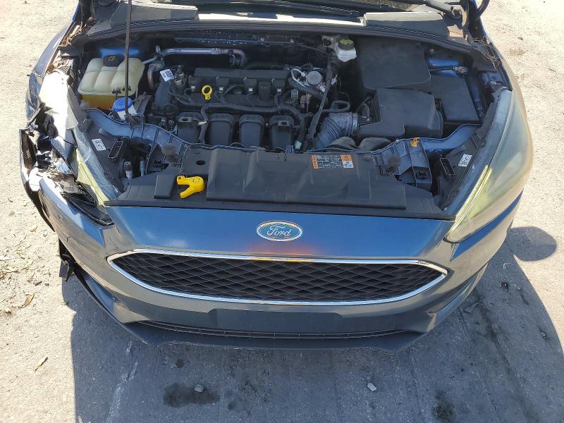 Photo 11 from auction – 2018 FORD FOCUS with VIN 1FADP3M21JL308441