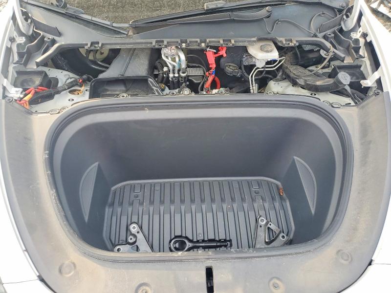 Photo 11 from auction – 2023 TESLA MODEL Y with VIN 7SAYGDEE6PA028715
