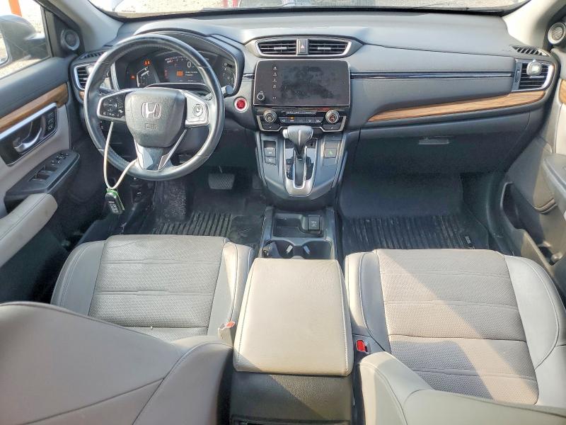 Photo 8 from auction – 2017 HONDA CR-V with VIN 7FARW1H80HE035158