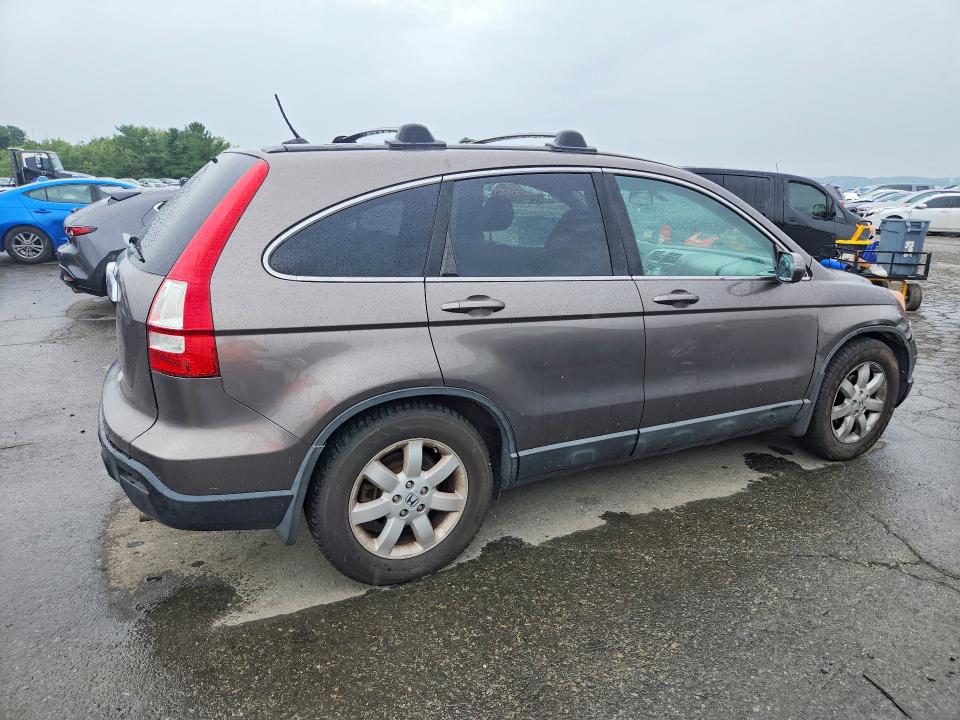 Photo 3 from auction – 2009 HONDA CR-V with VIN 5J6RE48709L025634