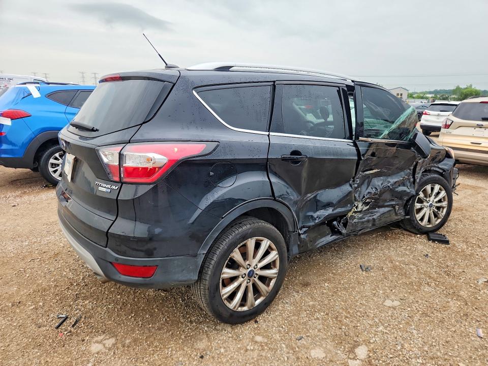Photo 3 from auction – 2017 FORD ESCAPE with VIN 1FMCU9J97HUA58531