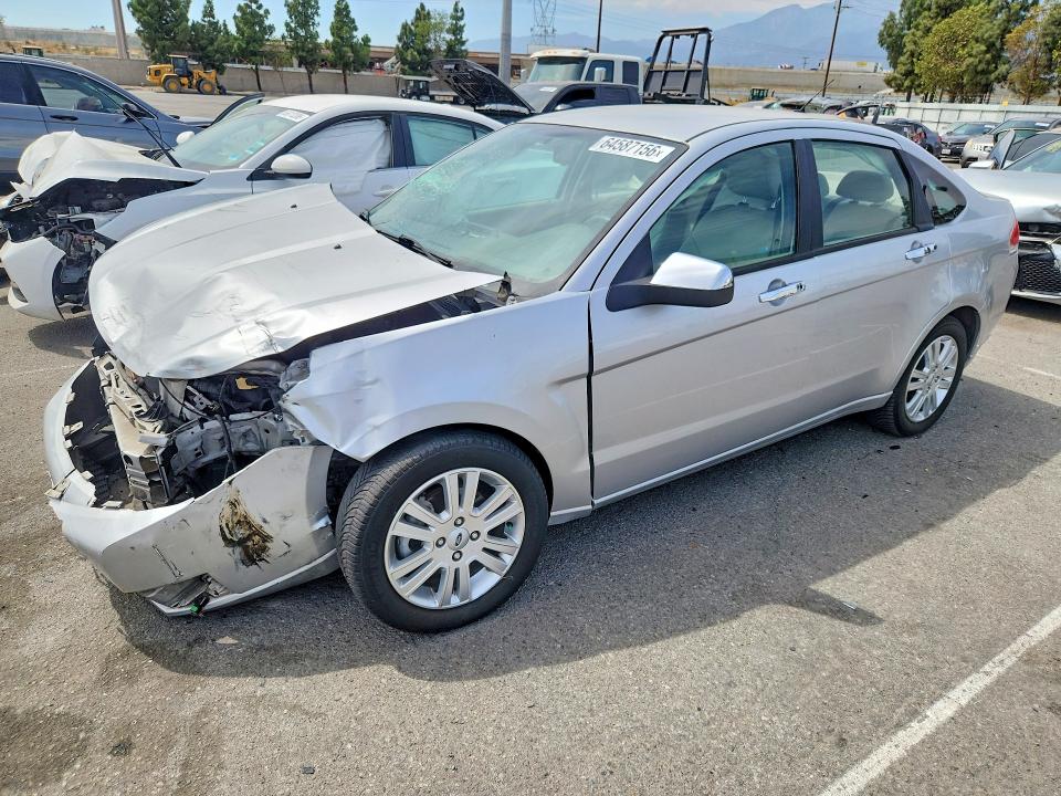FORD FOCUS 2010 with VIN 1FAHP3HN1AW292262 - Photo from auction