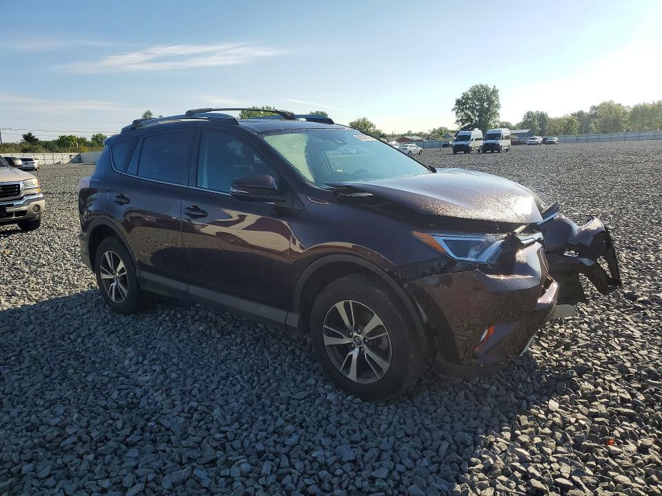 Photo 4 from auction – 2018 TOYOTA RAV4 with VIN 2T3RFREV2JW770230