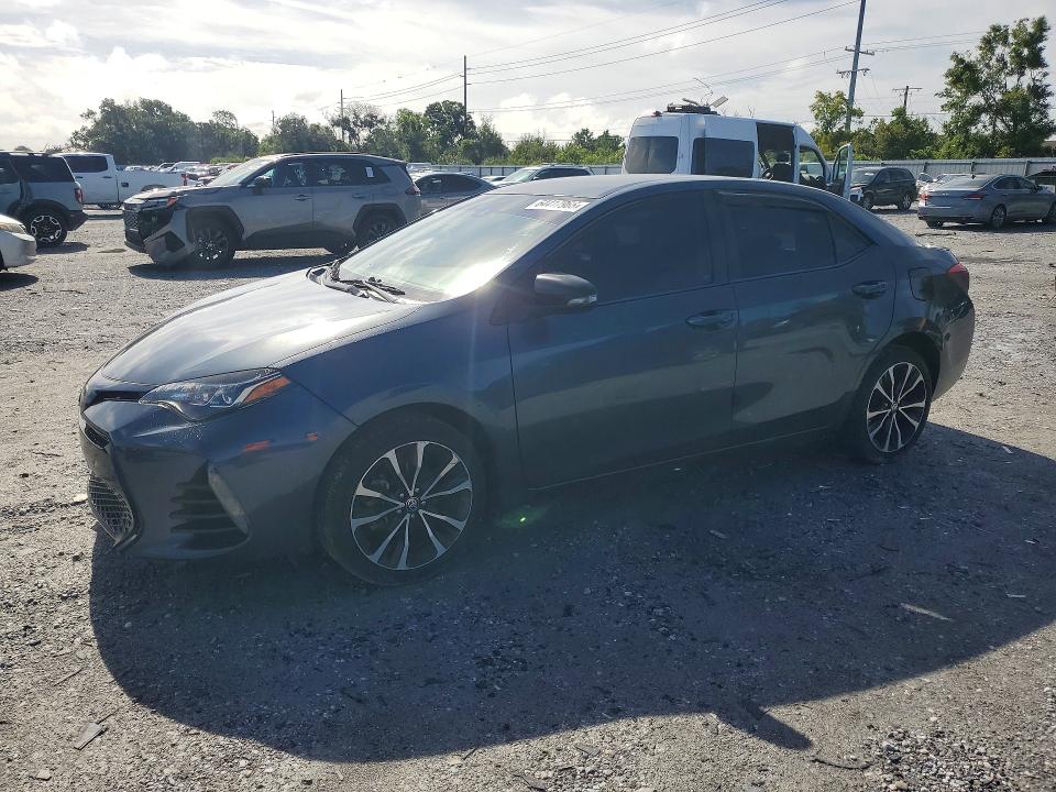 TOYOTA COROLLA 2017 with VIN 5YFBURHE8HP648480 - Photo from auction
