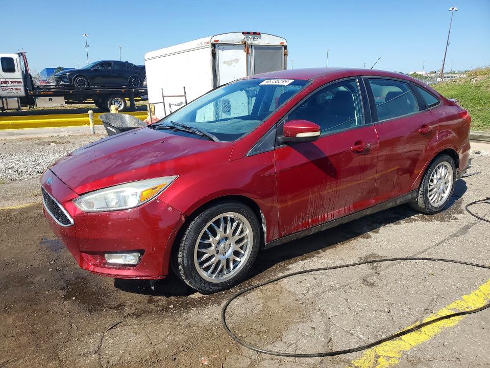 FORD FOCUS 2015 with VIN 1FADP3F29FL260739 - Photo from auction