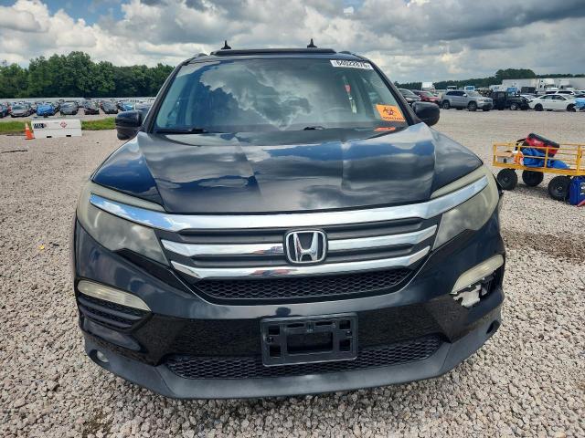 Photo 5 from auction – 2016 HONDA PILOT with VIN 5FNYF5H88GB027337