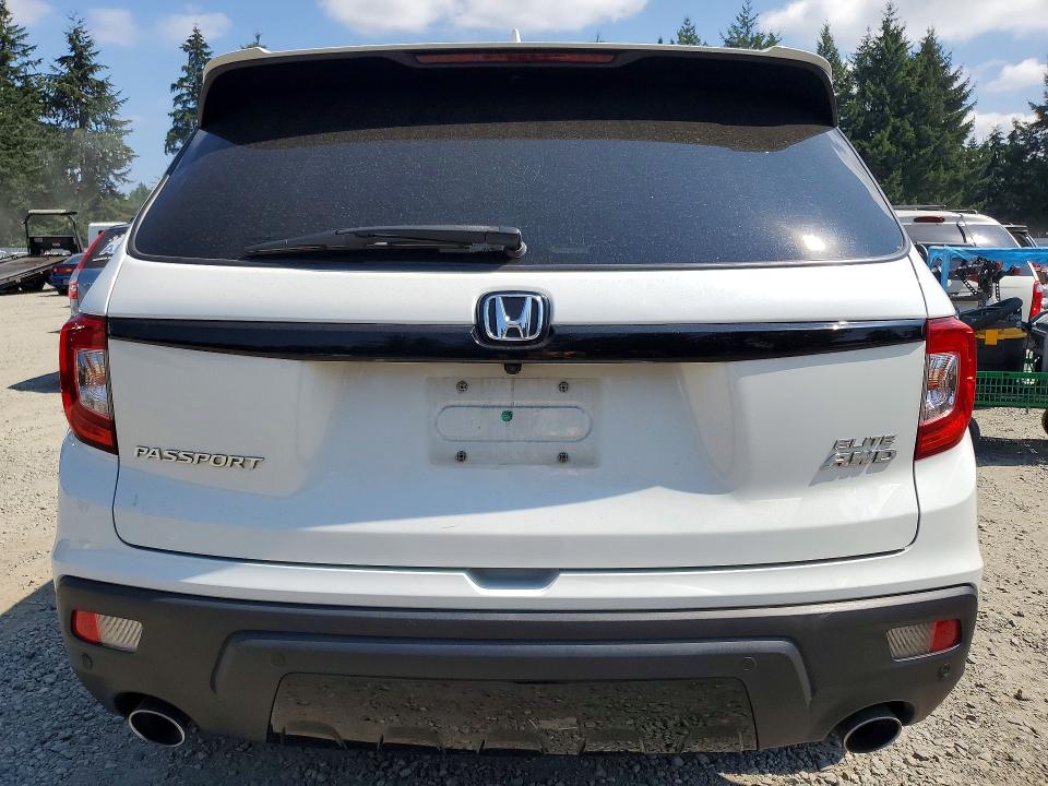 Photo 6 from auction – 2021 HONDA PASSPORT with VIN 5FNYF8H00MB013794