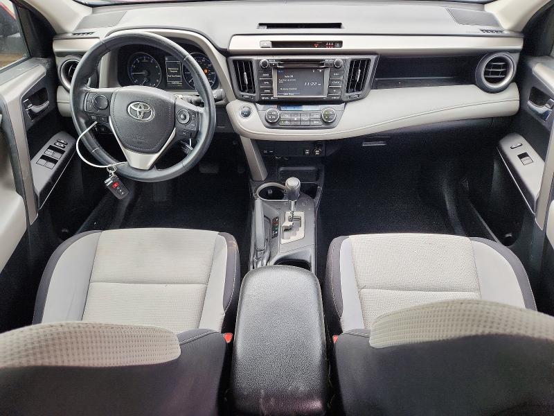 Photo 8 from auction – 2018 TOYOTA RAV4 with VIN 2T3RFREV2JW740743