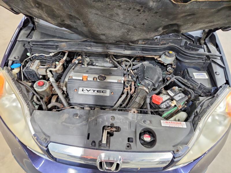 Photo 12 from auction – 2007 HONDA CR-V with VIN JHLRE485X7C097140
