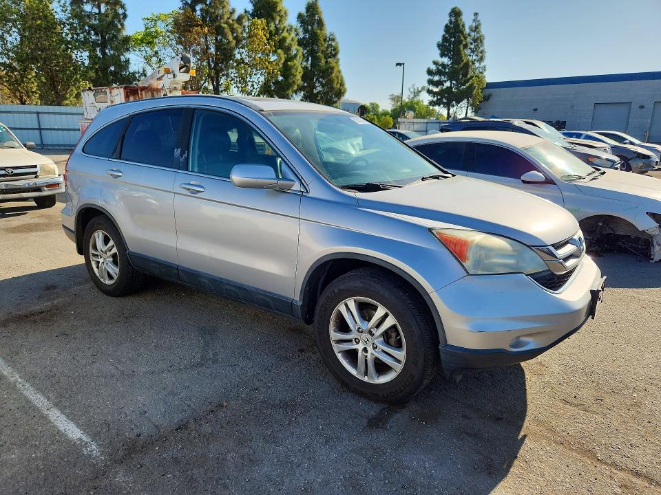 Photo 4 from auction – 2011 HONDA CR-V with VIN 5J6RE3H77BL054001