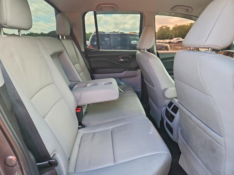 Photo 10 from auction – 2017 HONDA RIDGELINE with VIN 5FPYK3F51HB002488