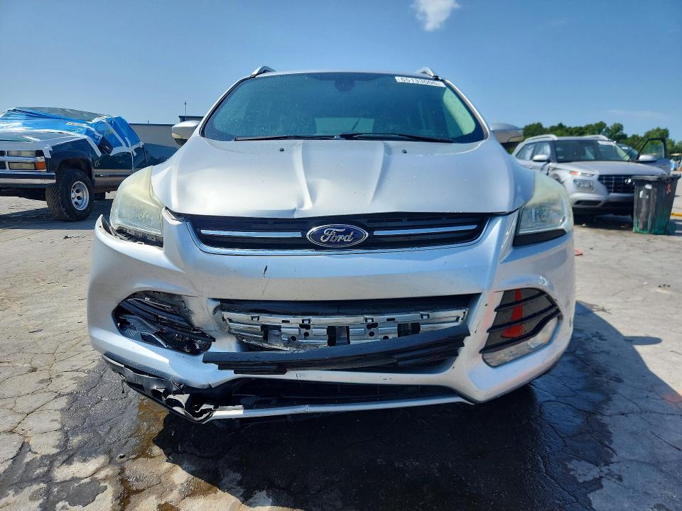 Photo 5 from auction – 2014 FORD ESCAPE with VIN 1FMCU0J94EUE51359