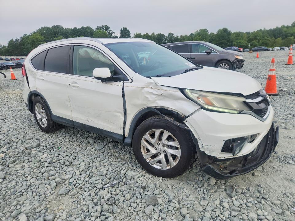 Photo 4 from auction – 2015 HONDA CR-V with VIN 5J6RM4H70FL021582