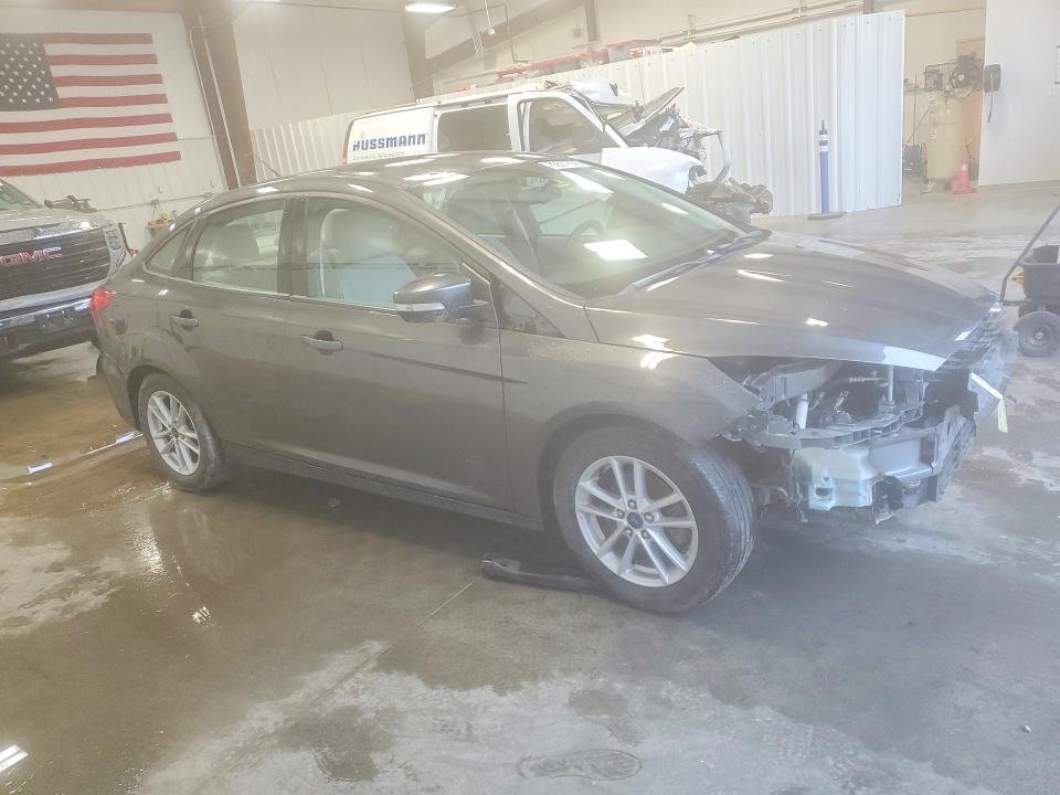 Photo 4 from auction – 2015 FORD FOCUS with VIN 1FADP3F23FL226540