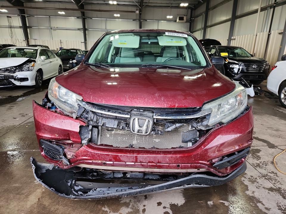 Photo 5 from auction – 2016 HONDA CR-V with VIN 5J6RM4H49GL075888