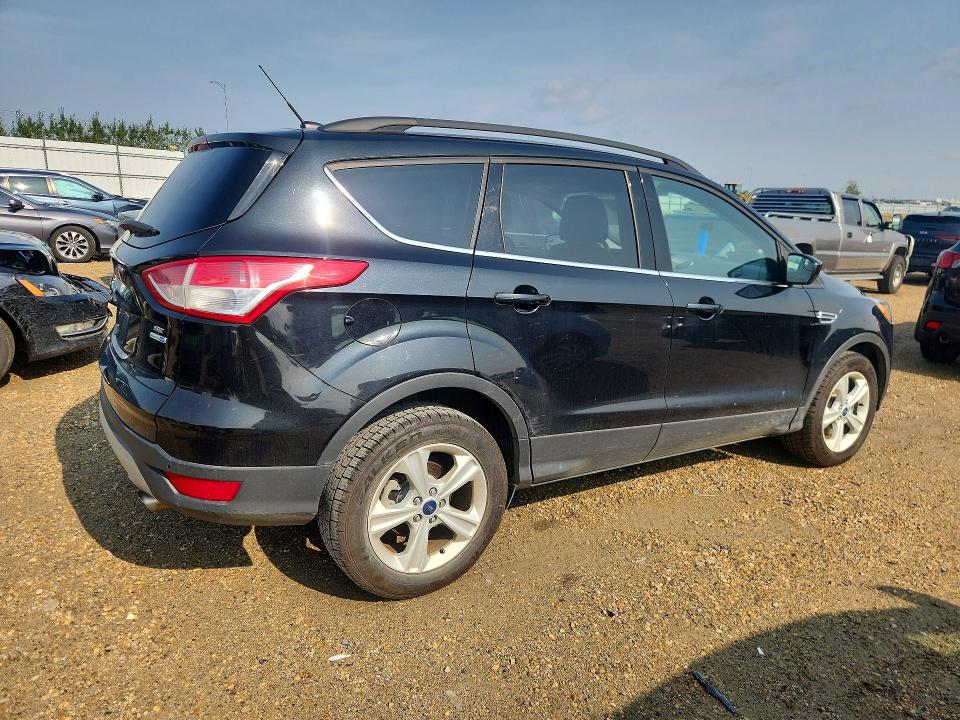 Photo 3 from auction – 2014 FORD ESCAPE with VIN 1FMCU9G97EUC95829
