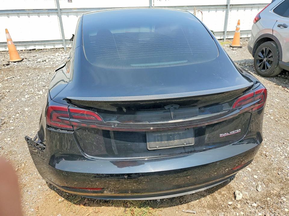 Photo 6 from auction – 2022 TESLA MODEL 3 with VIN 5YJ3E1ECXNF239443