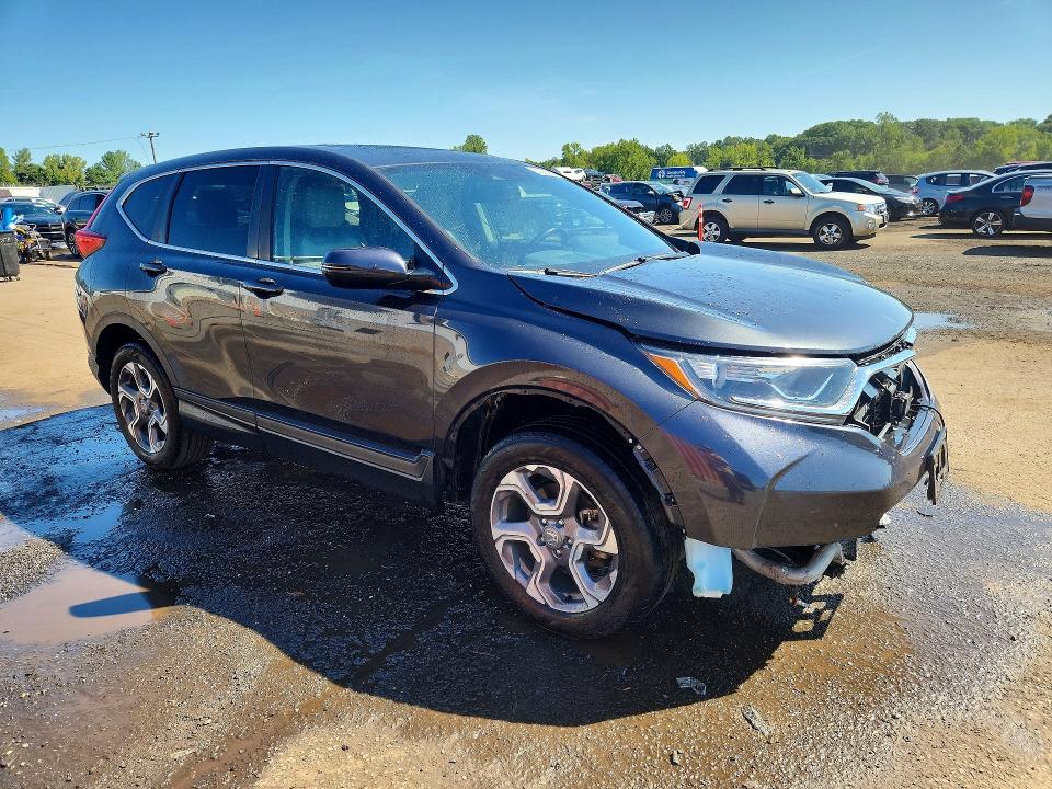 Photo 4 from auction – 2018 HONDA CR-V with VIN 7FARW2H84JE025986