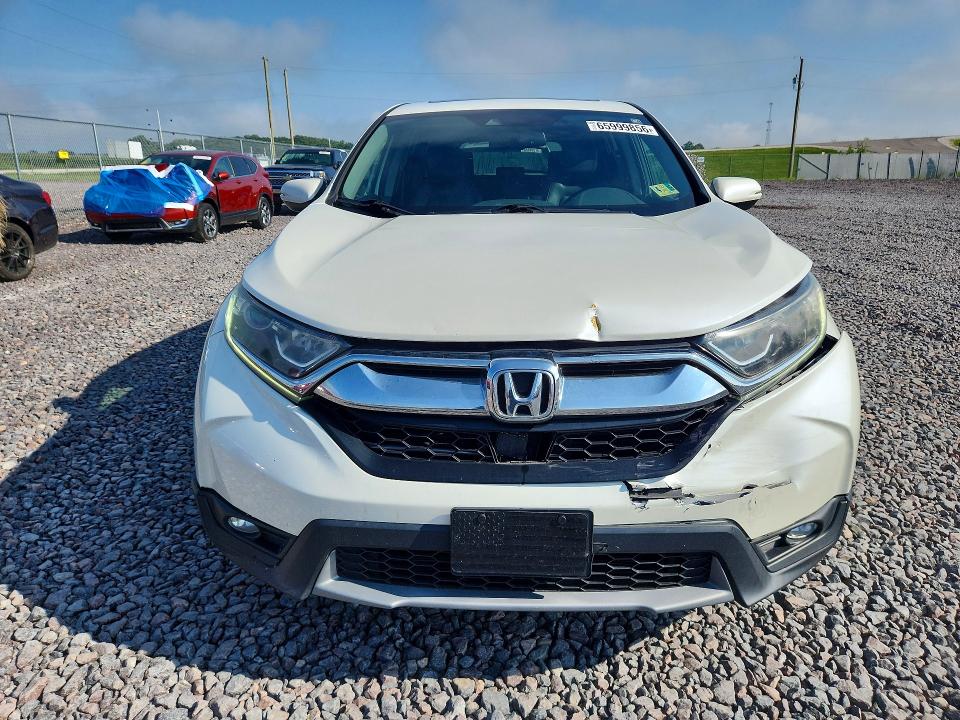 Photo 5 from auction – 2017 HONDA CR-V with VIN 2HKRW1H85HH504516