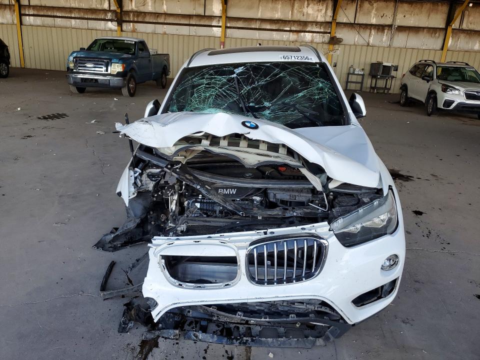 Photo 5 from auction – 2018 BMW X1 with VIN WBXHU7C33J5L06848