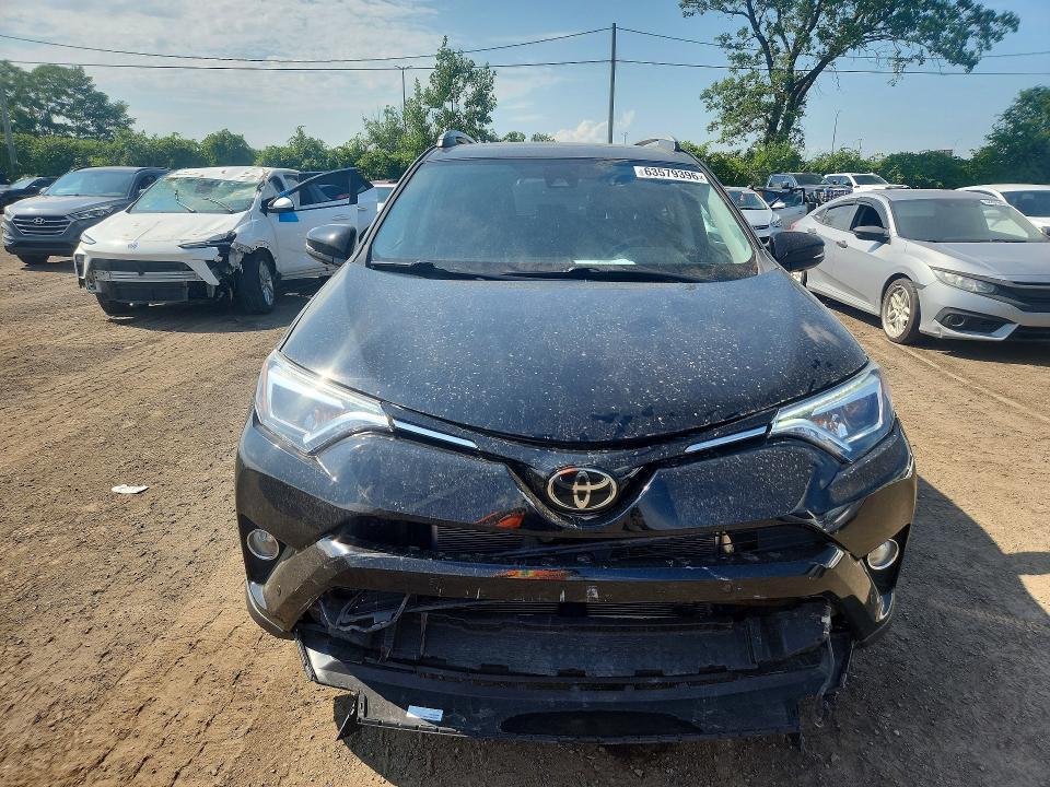 Photo 5 from auction – 2018 TOYOTA RAV4 with VIN 2T3DFREV6JW715905