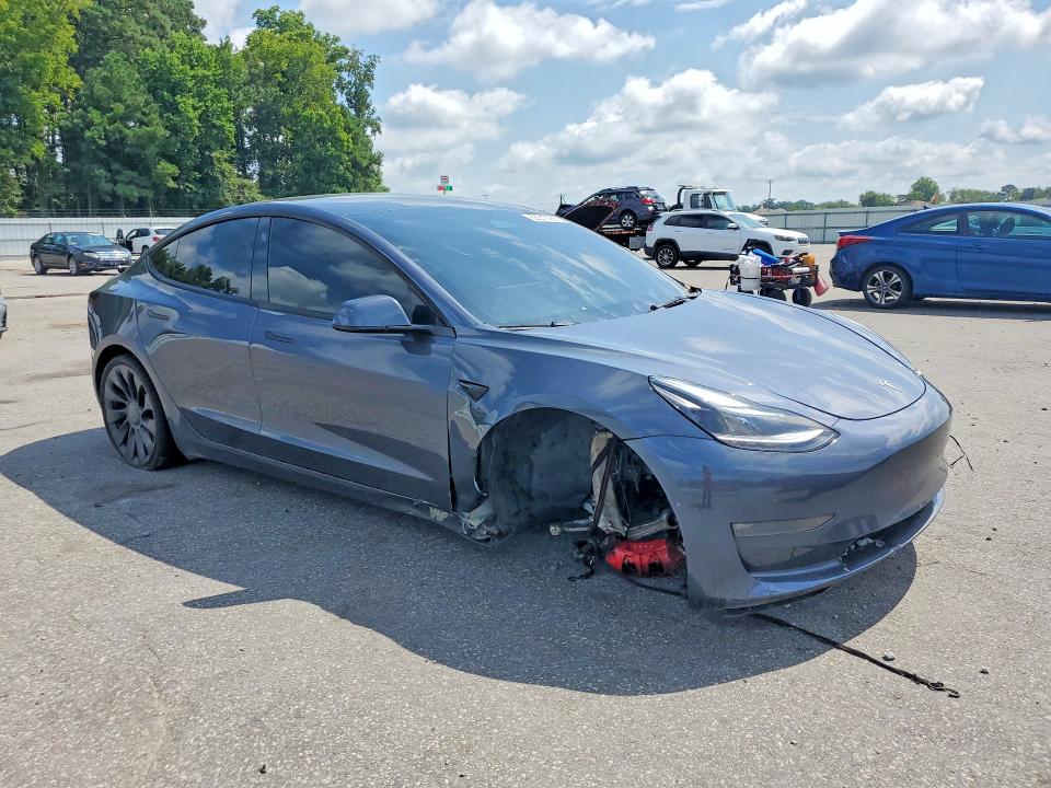 Photo 4 from auction – 2022 TESLA MODEL 3 with VIN 5YJ3E1EC3NF330277