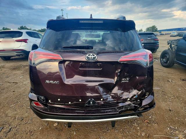 Photo 6 from auction – 2016 TOYOTA RAV4 with VIN 2T3RFREV7GW453892