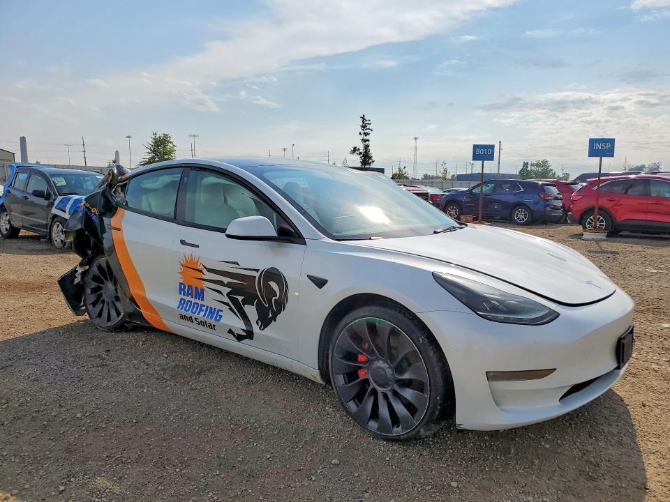 Photo 4 from auction – 2023 TESLA MODEL 3 with VIN 5YJ3E1EC5PF464579