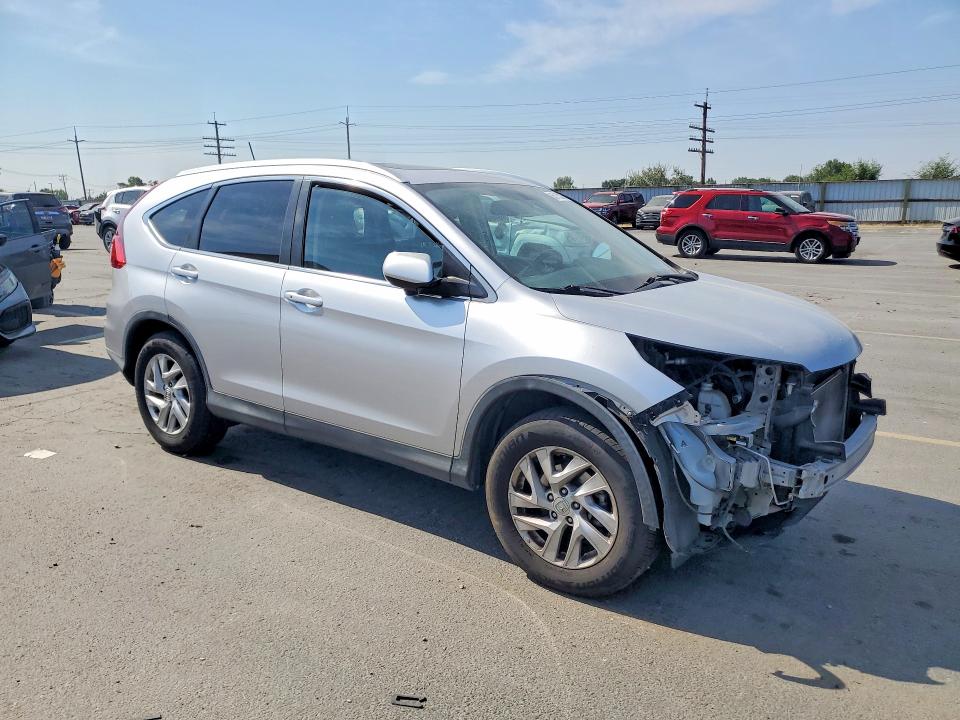 Photo 4 from auction – 2015 HONDA CR-V with VIN 2HKRM4H76FH617368
