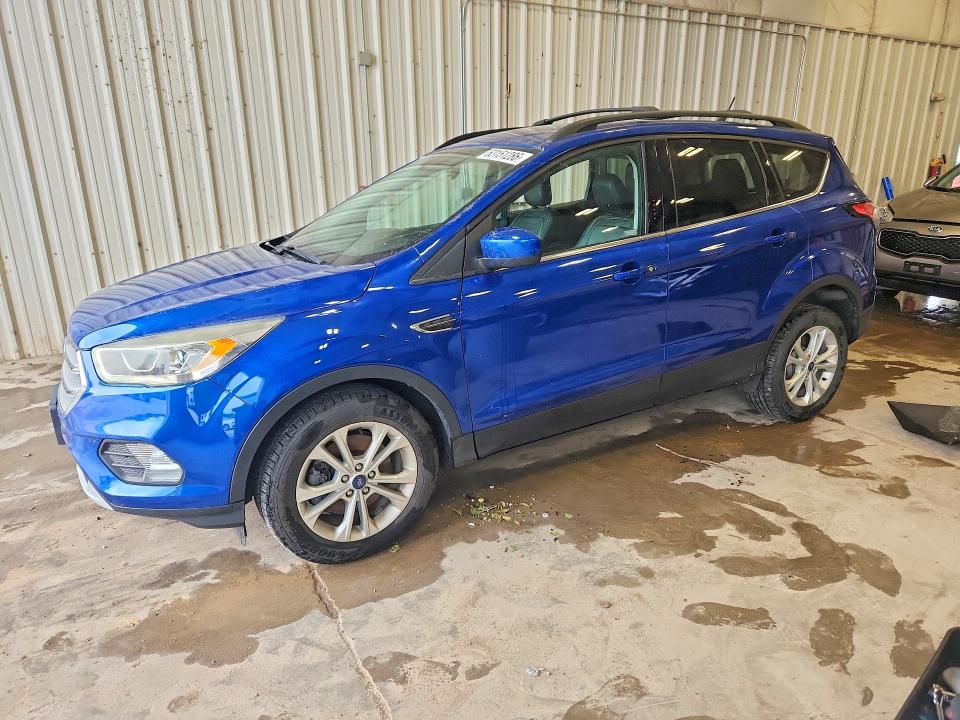 FORD ESCAPE 2018 with VIN 1FMCU9HD0JUA88096 - Photo from auction