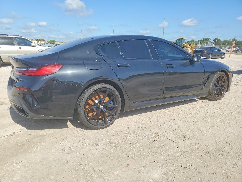 Photo 3 from auction – 2021 BMW M850XI with VIN WBAGV8C08MCF68611