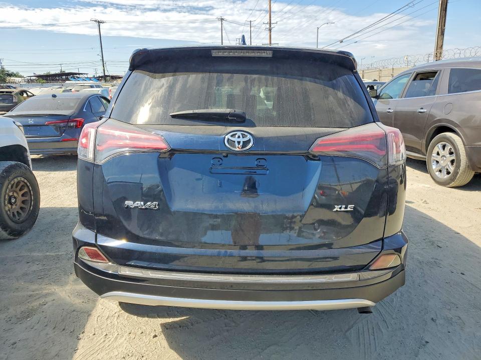 Photo 6 from auction – 2018 TOYOTA RAV4 with VIN JTMWFREV6JJ190299