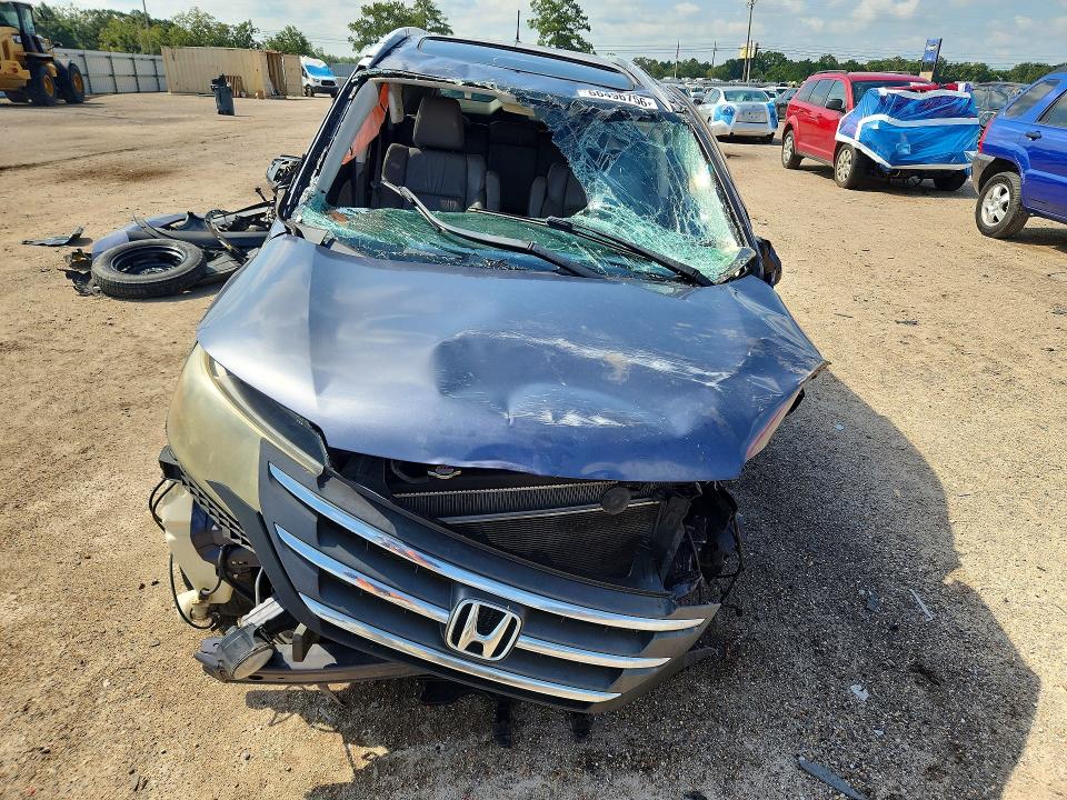 Photo 5 from auction – 2012 HONDA CR-V with VIN JHLRM3H77CC009296