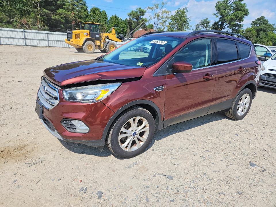 FORD ESCAPE 2018 with VIN 1FMCU0GD1JUA95393 - Photo from auction