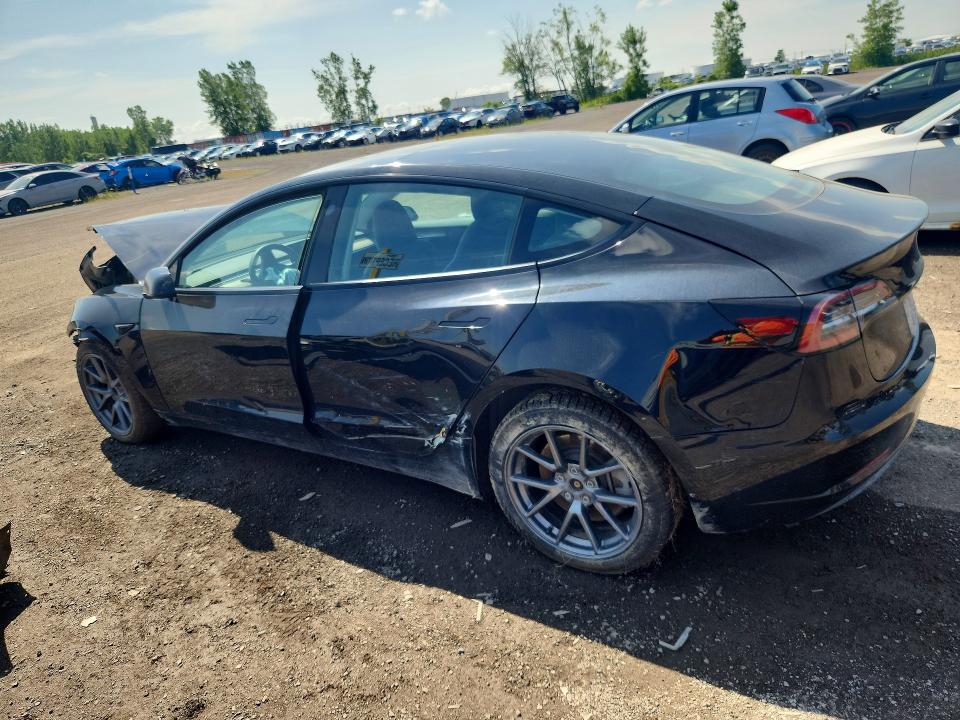 Photo 2 from auction – 2023 TESLA MODEL 3 with VIN LRW3E1FA1PC944397